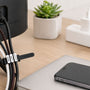 A desk with cables bundled and labelled using ELYPRO reusable cable ties
