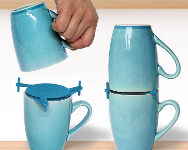 A second mug placed upside down on an ELYPRO Mug Stacker above an upright mug in a kitchen cabinet