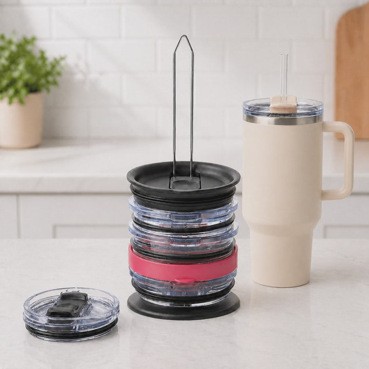 Tumbler lids slid one by one onto the rod of the ELYPRO vertical lid organizer until they stand in one stack on the counter