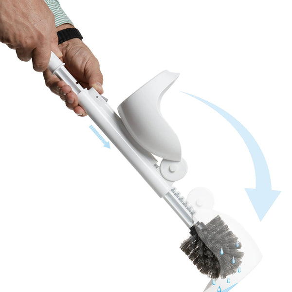 The drip cover sliding down the handle to catch water under the brush head as it is lifted