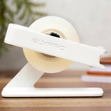 White ELYPRO tape dispenser holding a roll of clear tape on a wooden desk